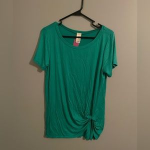 Soft green top with knot at bottom.
